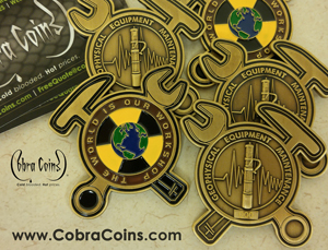 Geophysical Equipment Maintenance coin Custom shaped coin
2D globe Front and 3D Back Swirl Edge cuts Antique Brass cobra coins cobracoins.com